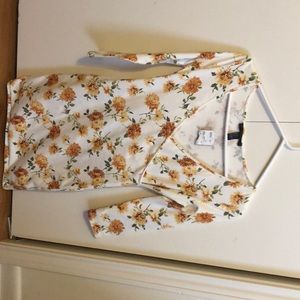 Beautiful floral fitted mini dress!